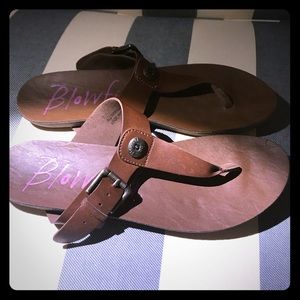 Leather flip flops.